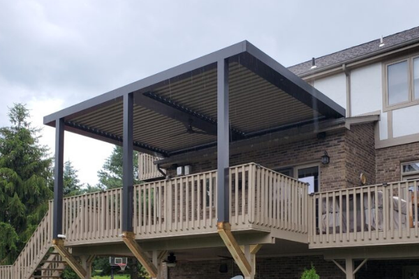 black and tan pergola over home's deck