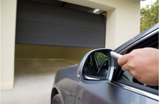 What are the advantages of a garage door opener with a vacation mode? 2